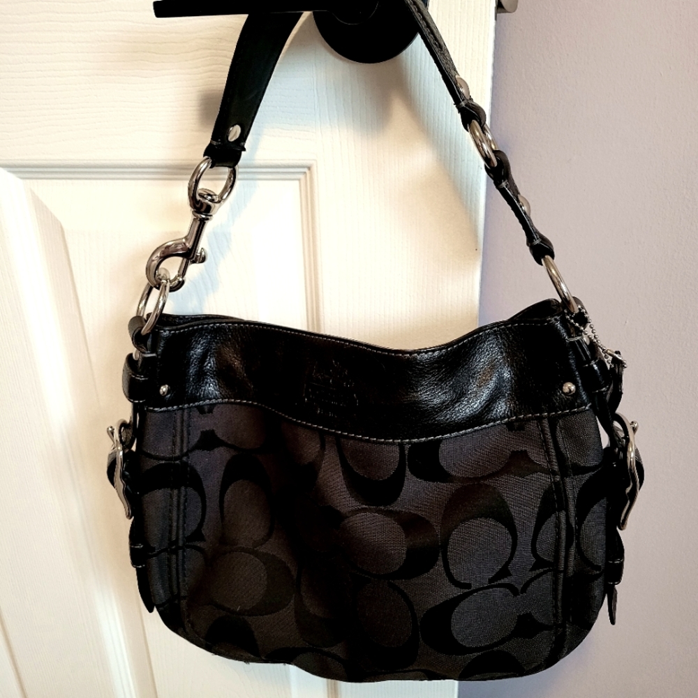 Authentic black medium size Coach handbag, aqua blue lining, like new condition